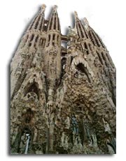 Anton Gaudi - The completed east transept of the Sagrada Familia with its four towers and three portals.