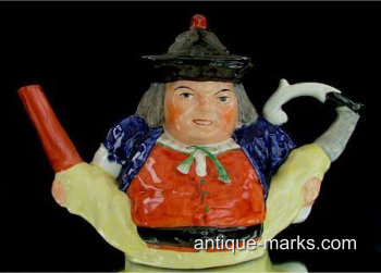 Be passionate buy antiques you love - Novelty antique teapots for instance