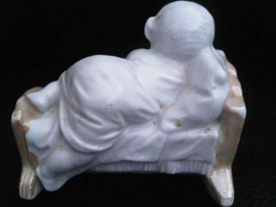 back of Baby Figure Money Bank