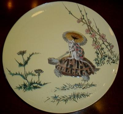 Antique enamel plate with tortoise and mouse