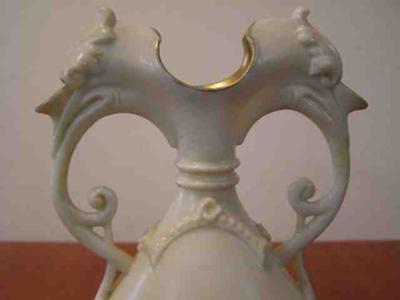 Doulton Vase showing eagle or phoenix heads