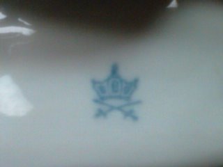 Mark on lower rear of Oriental porcelain figure